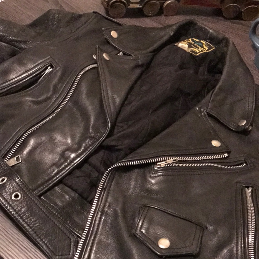 Black leather biker jacket… more pics available upon request